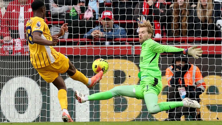 Danny Welbeck fires his shot past Caoimhin Kelleher to give Brighton a 2-0 lead at Brentford