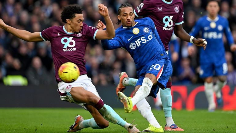 Joao Pedro shoots under pressure from Bashir Humphreys 