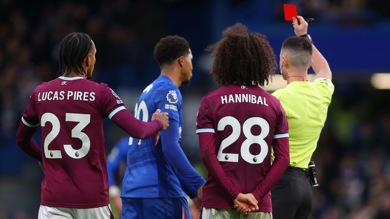 Wesley Fofana is shown a red card by referee Lewis Smith