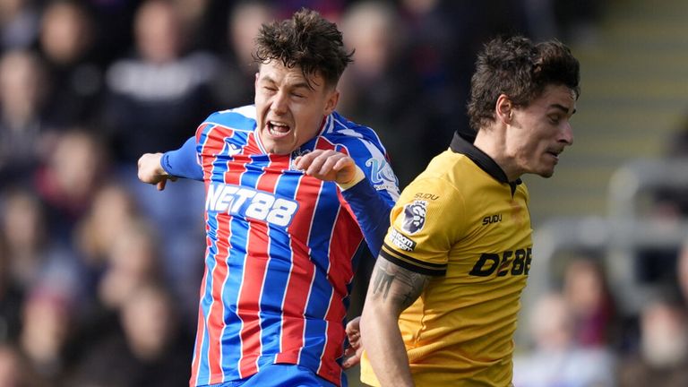 Jorgen Strand Larsen and Hugo Bueno compete to win a header