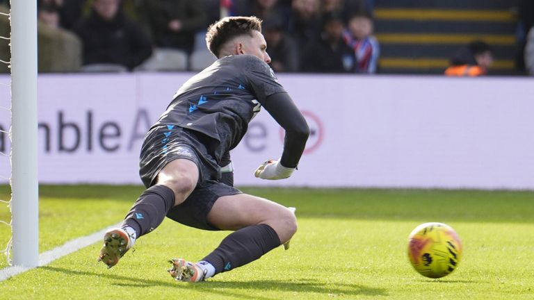 Den Henderson saves Tolu Arokodare's penalty