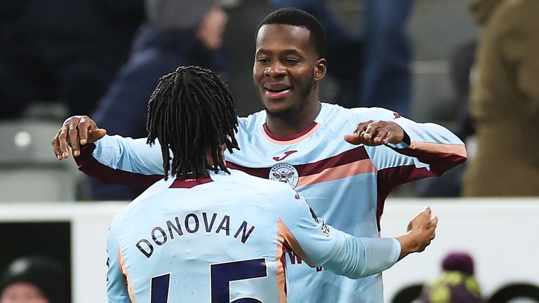 Dango Ouattara celebrates after giving Brentford a late 3-2 lead at Newcastle