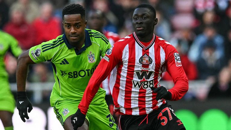 Ryan Sessegnon challenges Jocelin Ta Bi 