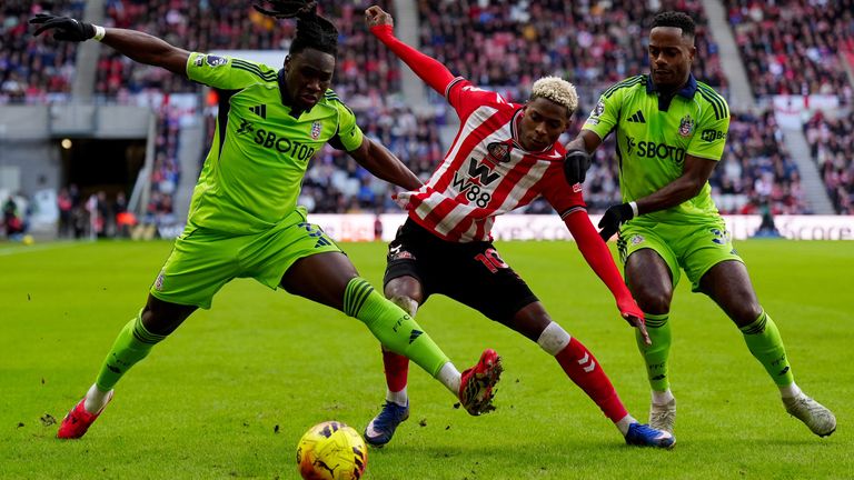 Nilson Angulo battles for the ball with Calvin Bassey and Ryan Sessegnon