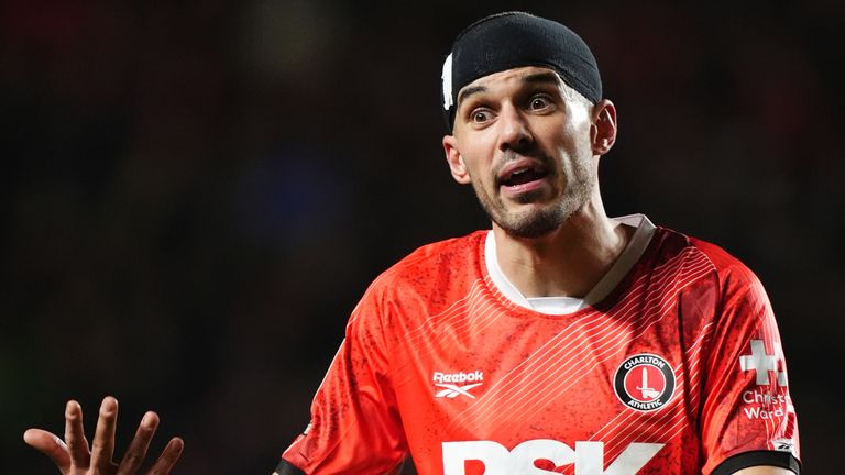 Conor Coady needed a bandage for a head injury from QPR's Harvey Vale