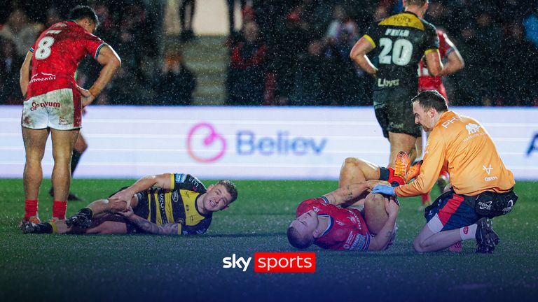 Hull KR's Mikey Lewis is penalised for sticking a leg out and tripping Liam Harris during their Super League match at York Knights.