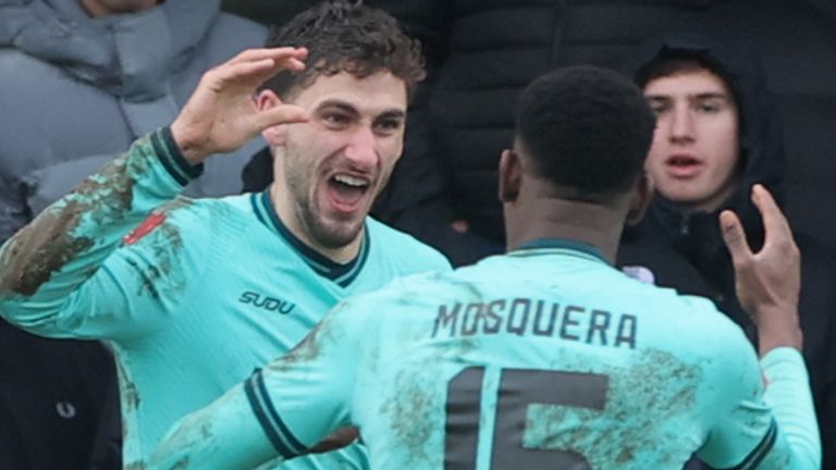 Santiago Bueno (left) celebrates scoring his sides first goal 