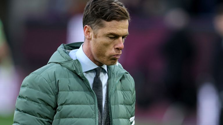 Scott Parker cuts a dejected figure after his Burnley side are beaten 2-1 by Mansfield Town