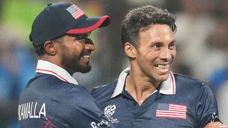 United States' Shadley van Schalkwyk (right) celebrates a wicket at the T20 World Cup (Associated Press)