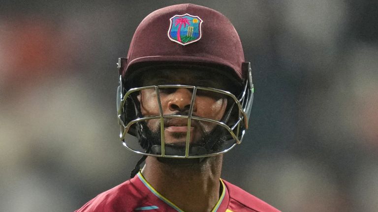 West Indies' captain Shai Hope leaves the ground after losing his wicket during the T20 World Cup cricket match between England and West Indies in Mumbai, India, Wednesday, Feb. 11, 2026. (AP Photo/Rafiq Maqbool)