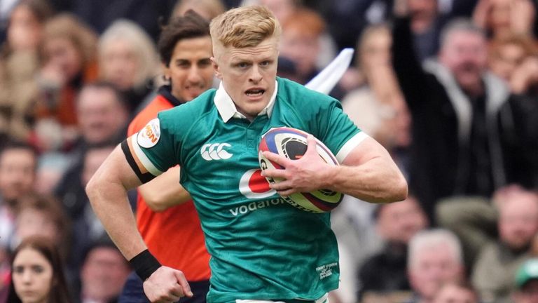 Tommy O'Brien runs through to score Ireland's third first-half try against England