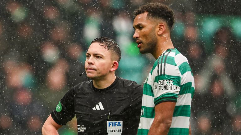 GLASGOW, SCOTLAND - FEBRUARY 22: Celtic's Auston Trusty (R) and Referee Matthew MacDermid before Trusty is sent off following an altercation with Hibernian's Jamie McGrath during a William Hill Premiership match between Celtic and Hibernian at Celtic Park, on February 22, 2026, in Glasgow, Scotland. (Photo by Craig Foy / SNS Group)