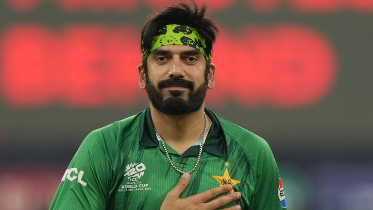 Pakistan's Usman Tariq acknowledges the crowed after taking a wicket during the 2026 Men's T20 World Cup (Associated Press)