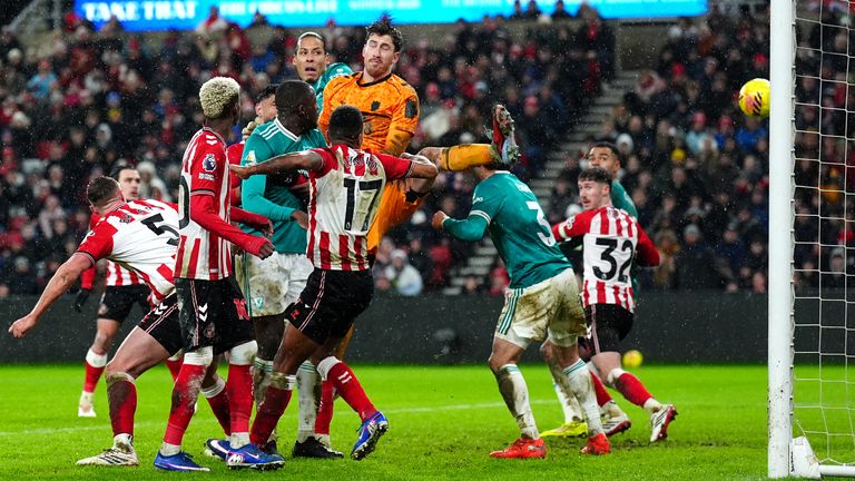 Virgil van Dijk opens the scoring for Liverpool