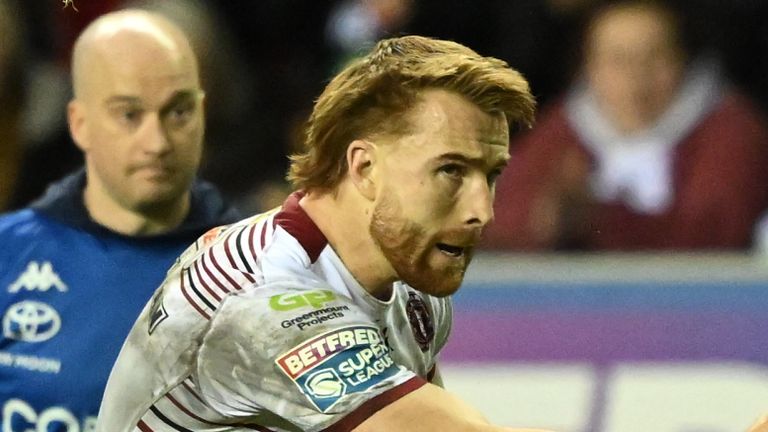   Adam Keighran muuttaa Junior Nsemban yrityksen Wiganiin (kuva Bruce Rollinson/SWpix.com)