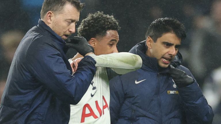 Tottenham Hotspur's Wilson Odobert is helped off the pitch (AP Photo/Ian Walton)