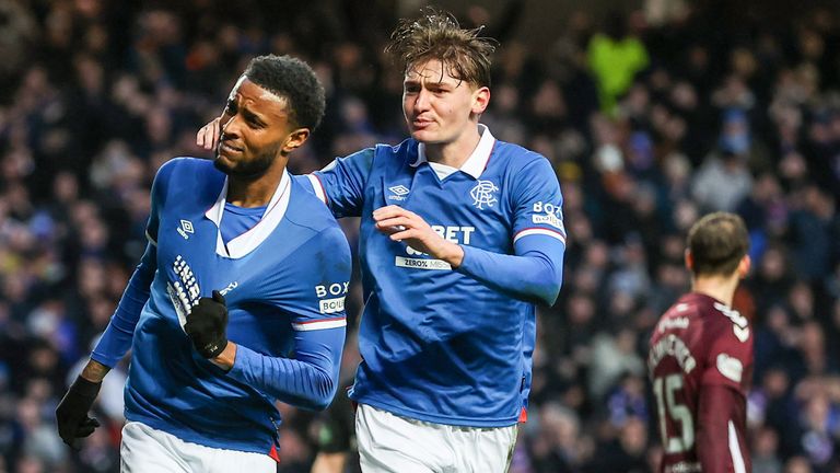 Rangers' Youssef Chermiti (L) celebrates after scoring against Hearts