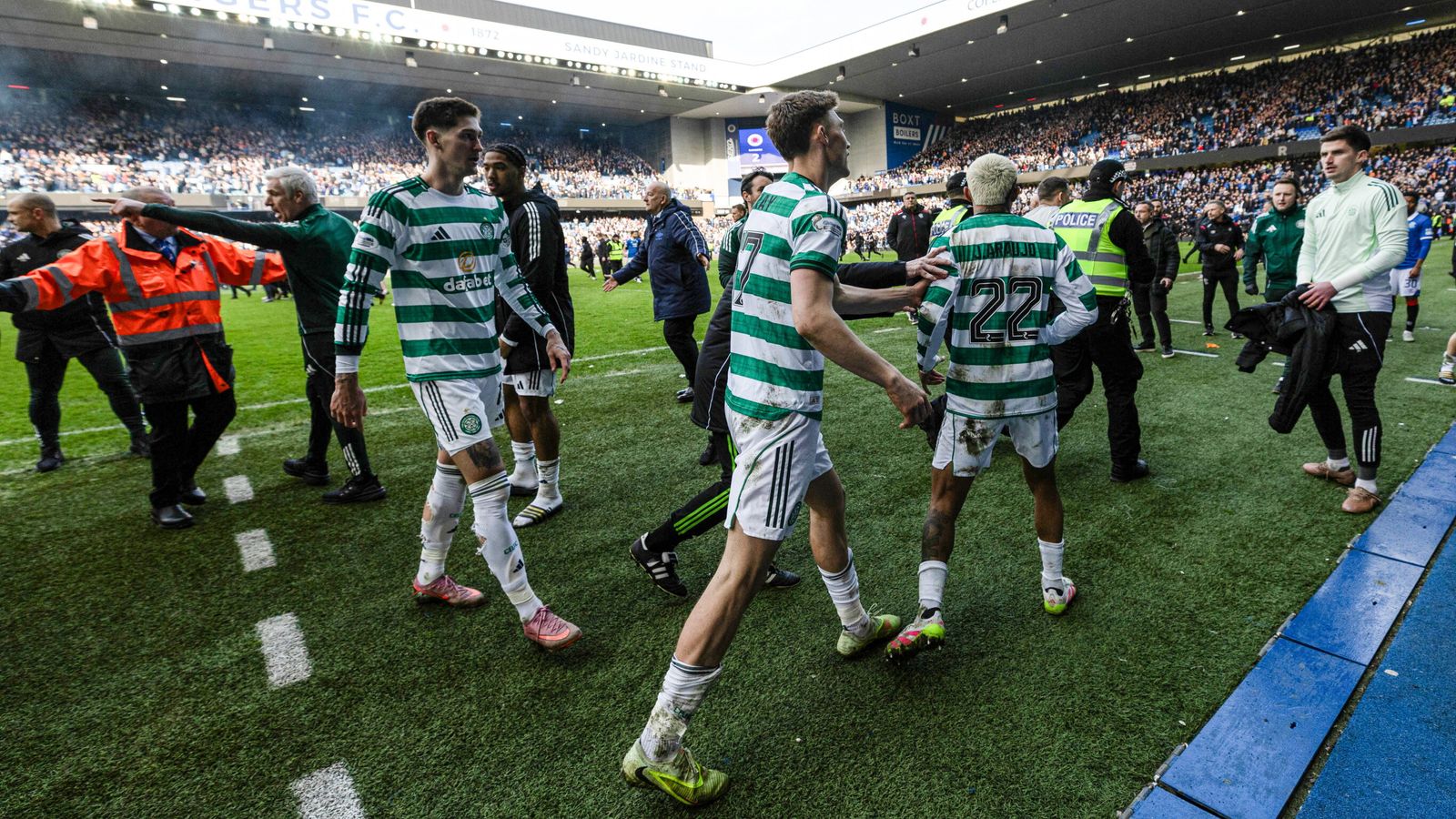 Celtic beat Rangers in dramatic penalty shoot-out in Scottish Cup quarter-final overshadowed by crowd trouble