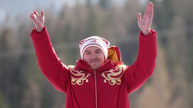 Russia's Aleksei Bugaev waves from the podium after winning a bronze medal. (AP Photo/Emilio Morenatti)