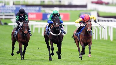 Old Park Star (centre) gets through to win the Supreme, ahead of Sober Glory (right) and Mydaddypaddy