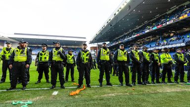 Police blocked fans from re-entering the pitch