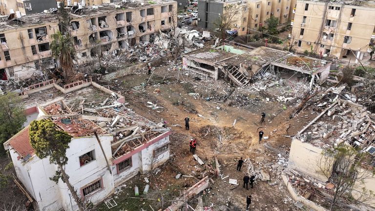 The aftermath of an Iranian missile strike in Dimona, southern Israel, on 22 March 2026. Pic: Reuters
