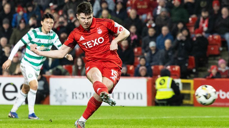 Aberdeen's Kevin Nisbet scores to make it 1-1 from the penalty spot against Celtic 