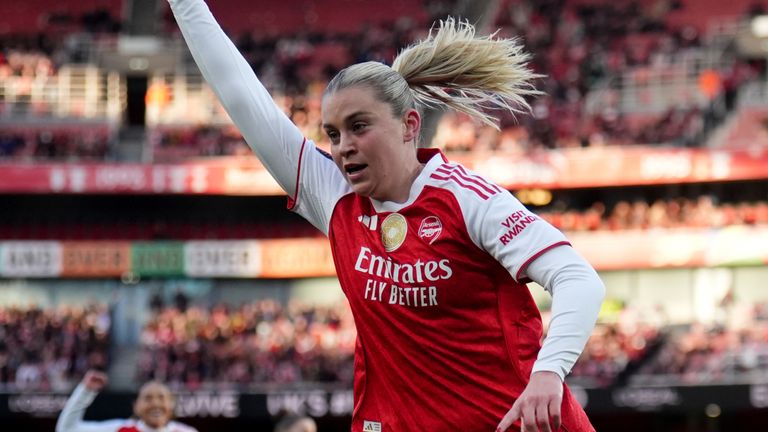 Alessia Russo celebrates after doubling Arsenal's lead against Spurs