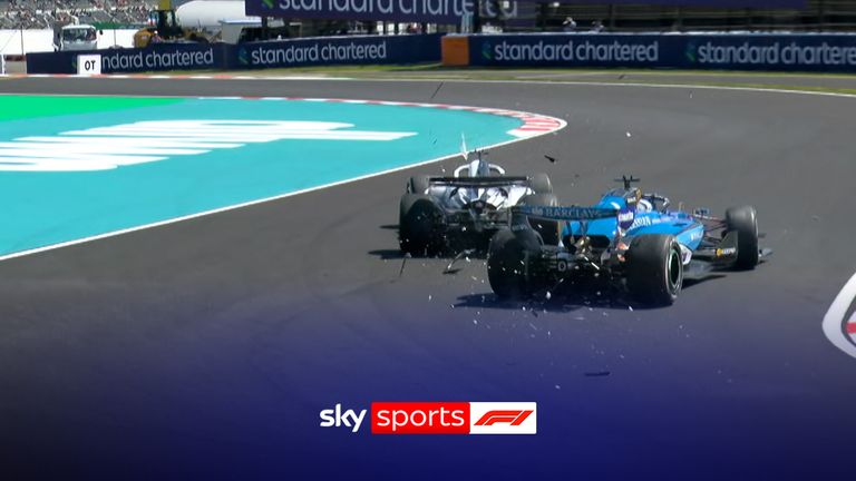 Alex Albon and Sergio Perez make contact in Practice One of the Japanese Grand Prix.