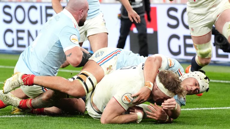 England's Alex Coles scores their side's fourth try of the game