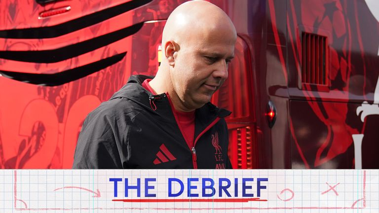 Liverpool head coach Arne Slot walking off the team bus for the game away to Brighton