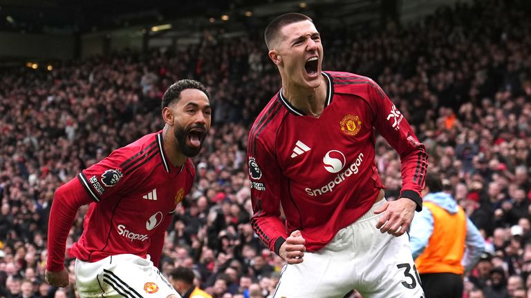 Benjamin Sesko (right) celebrates scoring Man Utd's third goal of the game