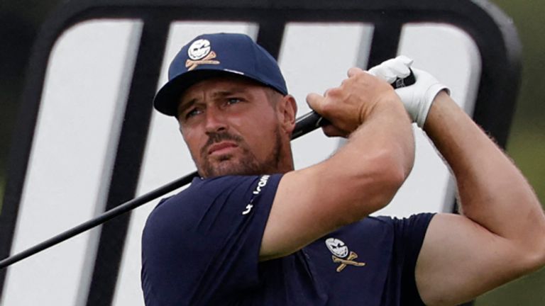 Crushers GC's US player Bryson Dechambeau watches a drive from the 14th tee on the fourth day of the LIV Golf South Africa tournament at The Club in Steyn City on March 22, 2026. (Photo by WIKUS DE WET / AFP)