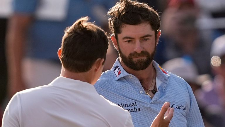 Cameron Young, right, speaks with Matt Fitzpatrick of England after the final round of The Players