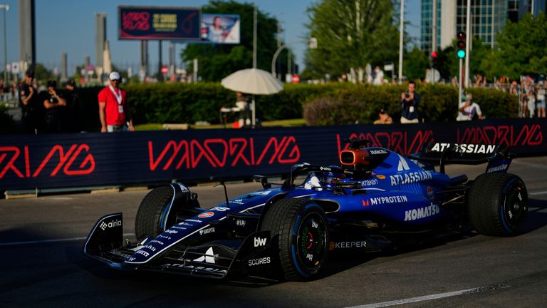 Williams driver Carlos Sainz of Spain steers his car during a demonstration on a section of the future Formula 1 street circuit in Madrid