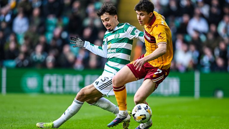 Celtic's Sebastian Tounekti (L) and Motherwell's Tom Sparrow (R) in action 