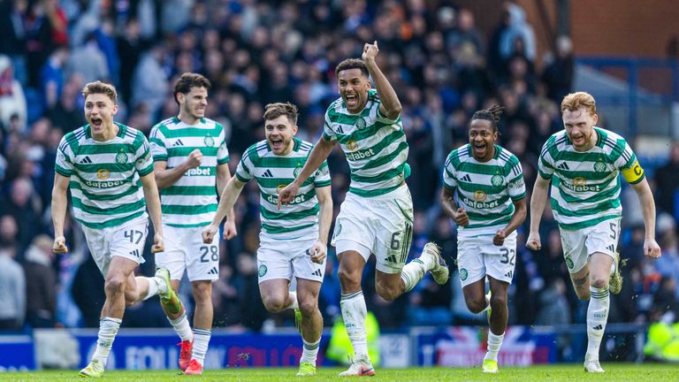 The Celtic squad celebrates as Tomas Cvancara scores the winning penalty