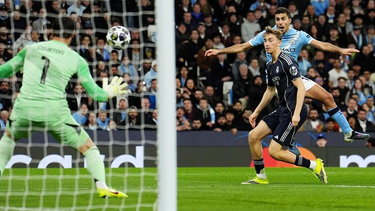 Rodri is denied by Thibault Courtois