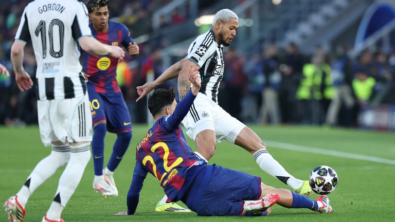 Joelinton rides a challenge from Marc Bernal 