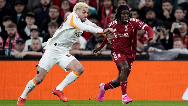 Baris Alper Yilmaz and Jeremie Frimpong battle for the ball