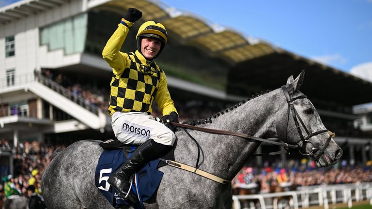 Harry Cobden celebrates on Kitzbuhel after winning the Brown Advisory Novices' Chase on day two of the 2026 Cheltenham Racing Festival