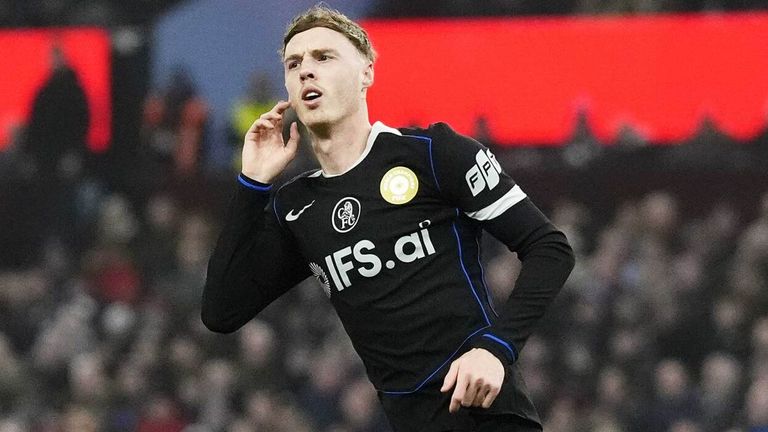 Cole Palmer celebrates after scoring Chelsea's third goal against Aston Villa