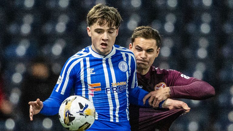 Kilmarnock's Findlay Curtis (L) and Hearts' Michael Steinwender (R) in action 