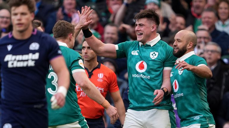 Ireland's Dan Sheehan (second from right) celebrates after scoring his team's second try. 