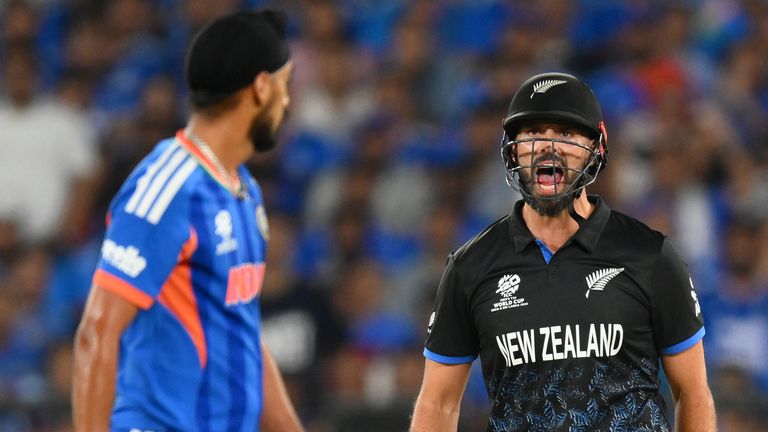 Daryl Mitchell reacts furiously after Arshdeep Singh throws the ball at him in the T20 World Cup final