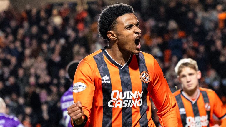 Dundee United's Amar Fatah celebrates scoring a penalty to make it 2-1 during the match between Dundee United and St Mirren