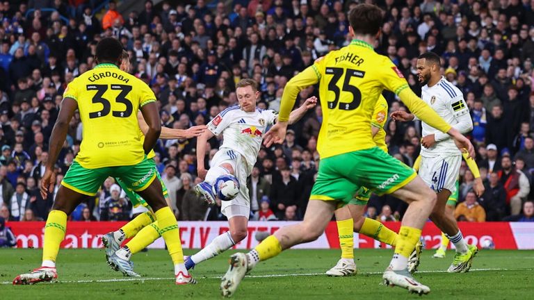 Sean Longstaff shoots on the turn to fire Leeds in front against Norwich