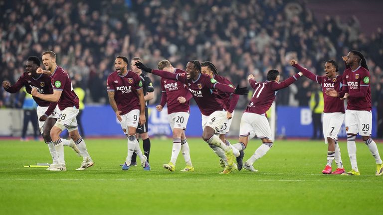 West Ham United's Axel Disasi (centre) and team-mates celebrate winning the penalty shoot-out against Brentford