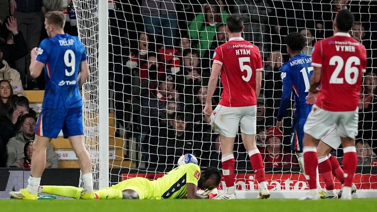 Wrexham goalkeeper Arthur Okonkwo despairs after a clearance rebounds off his back into his own net