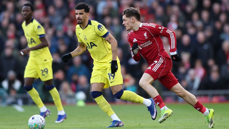 Florian Wirtz runs with the ball while under pressure from Dominic Solanke